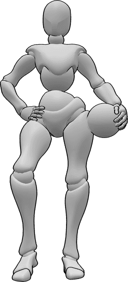 Referência de poses- Pose de uma jogadora de andebol - Jogadora de andebol em pé, com a mão direita na anca e a posar com uma bola de andebol