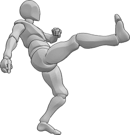Référence des poses- Posture du coup de pied haut - L'homme donne un coup de pied haut avec son pied droit, tout en serrant les poings.