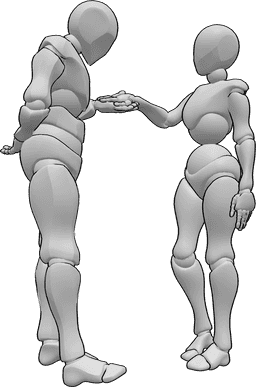 Riferimento alle pose- Posa educata del baciamano - Una donna e un uomo sono in piedi l'uno di fronte all'altro e l'uomo bacia gentilmente la mano della donna.