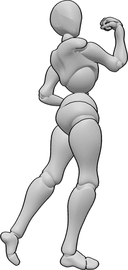 Riferimento alle pose- Femmina che mostra i muscoli in posa - Donna in forma è in piedi e in posa, mostrando i muscoli